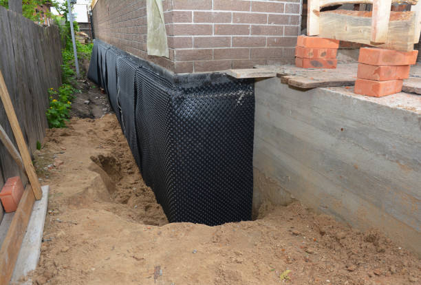 SJ Waterproofing Pros technician performing targeted Foundation Crack Repair assessment in Jenera, OH